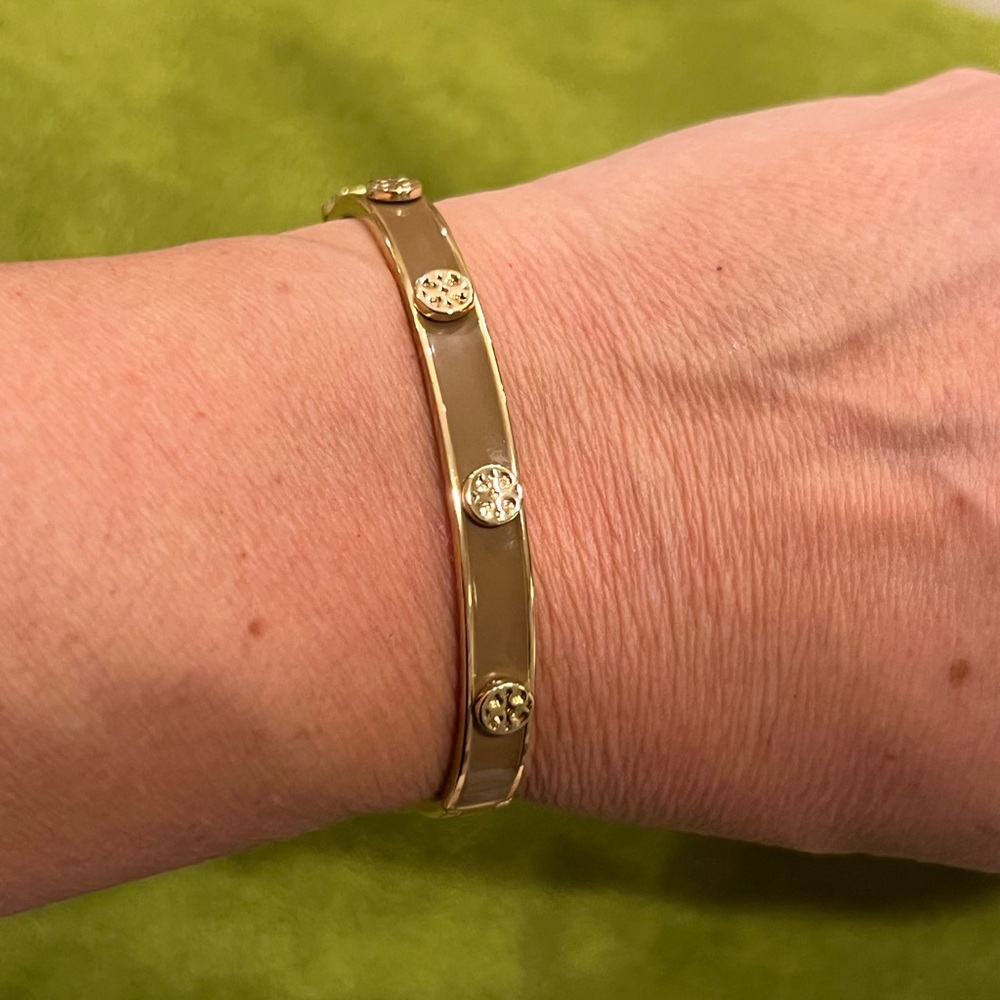 Tory Burch Miller Stud Hinge Bracelet in a brownish/mocha and gold-tone finish.